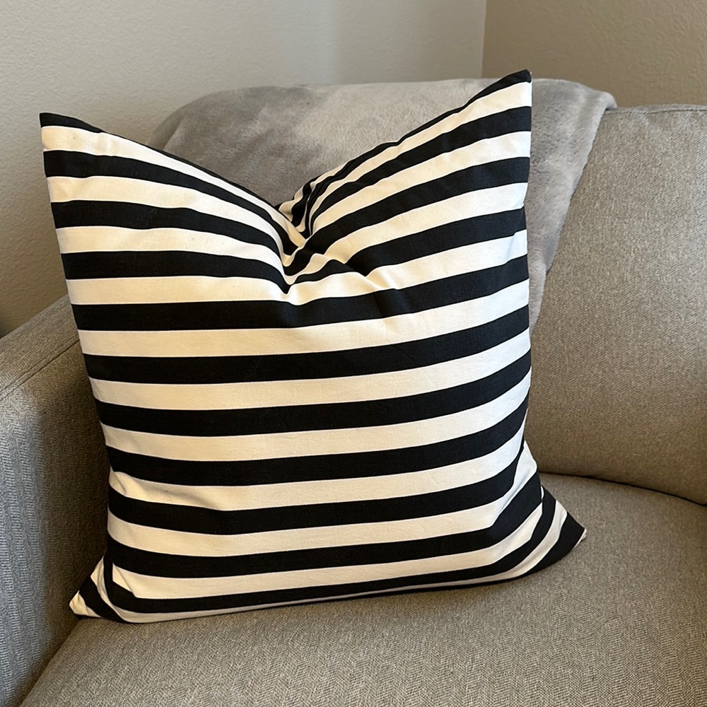 Dark grey and white striped decorative pillow